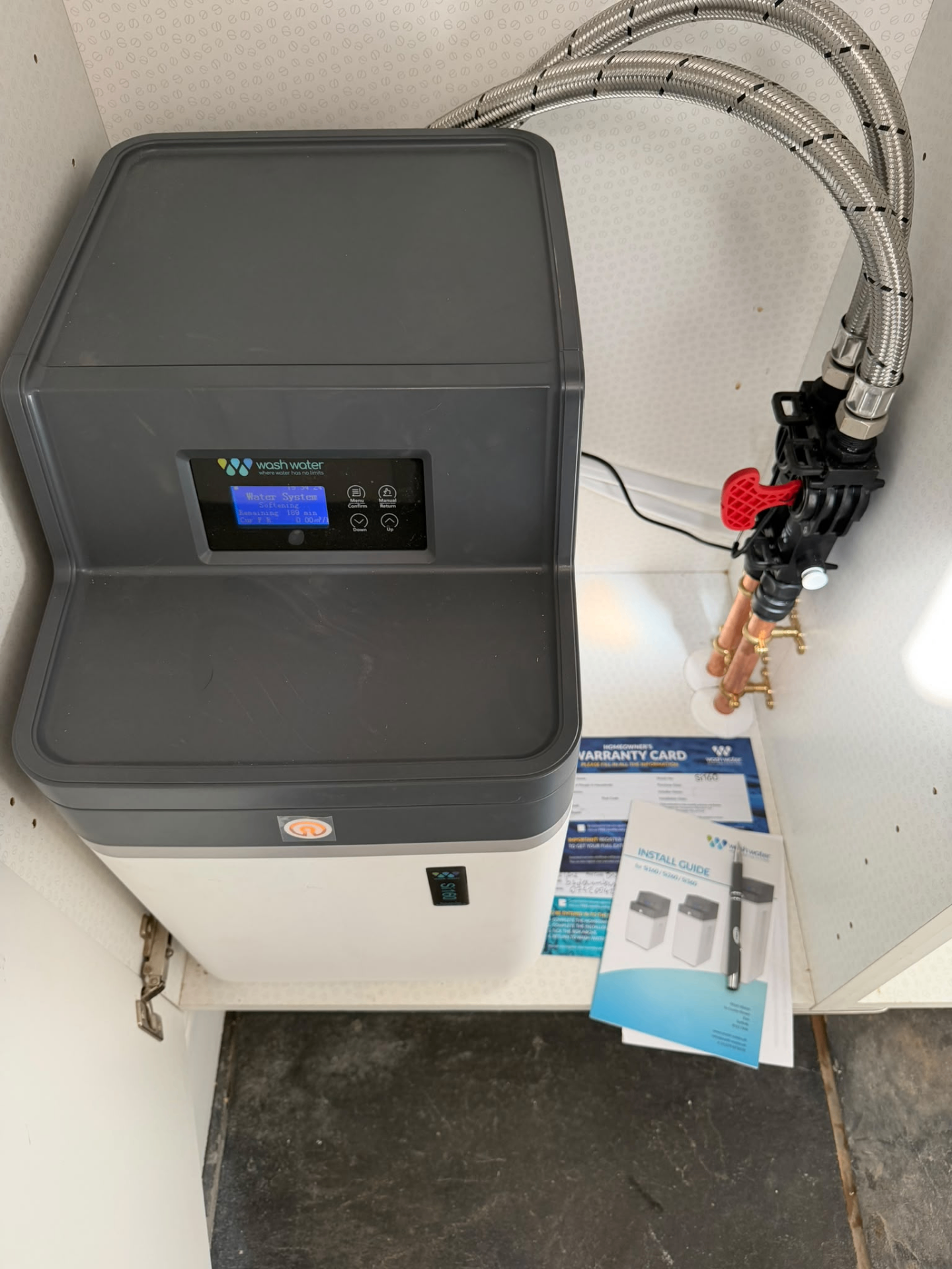 Wash Water softener installed in a Wiltshire kitchen cabinet by BTD Plumbing & Heating