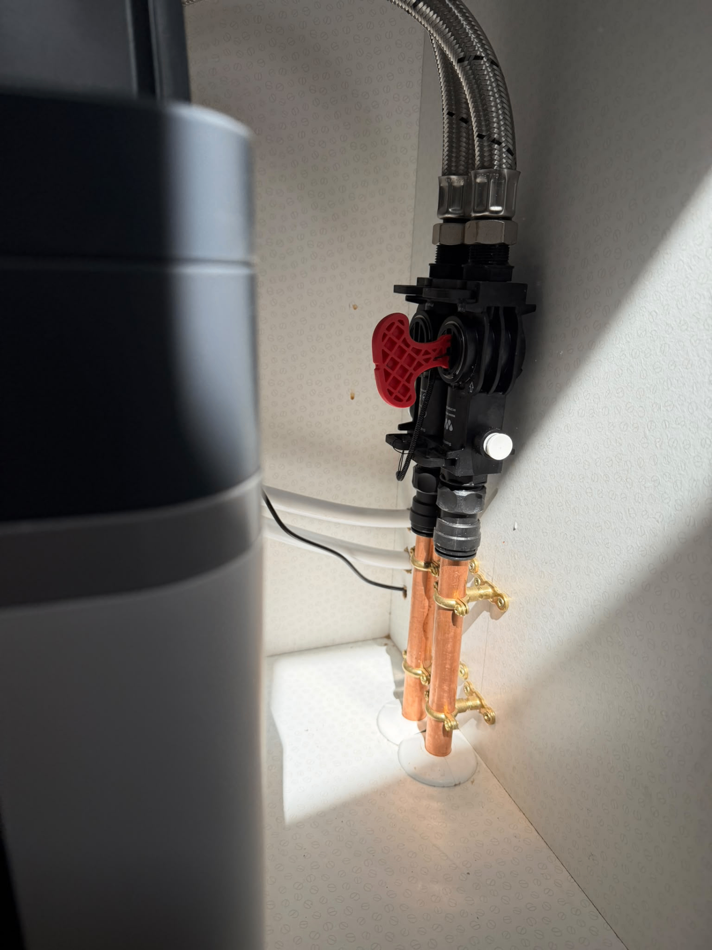 Neat copper pipework and bypass valve on a Wash Water softener install by BTD